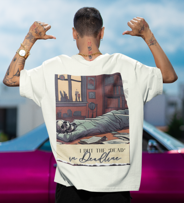 back-view-mockup-of-a-man-pointing-to-his-oversized-stanley-stella-t-shirt-m36829
