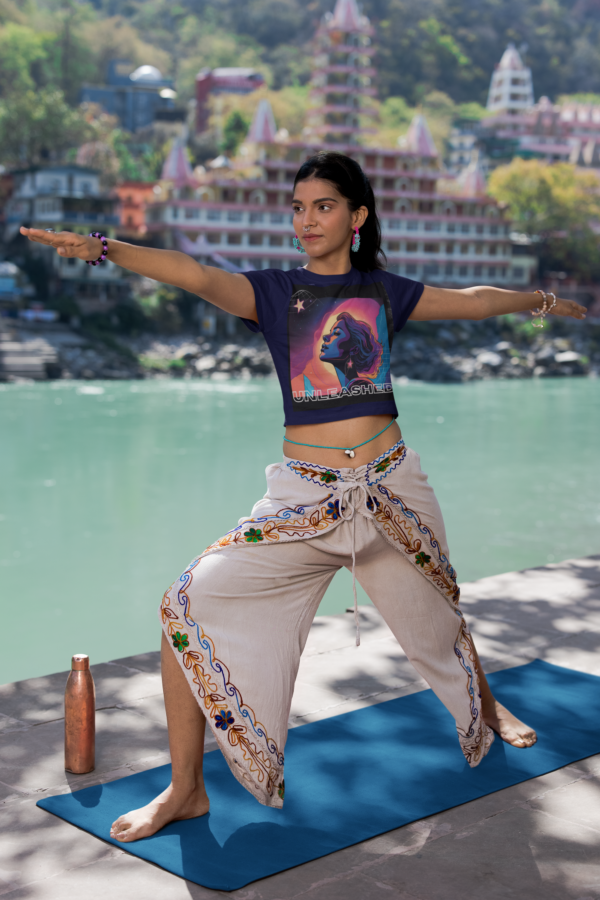 crop-top-mockup-featuring-a-woman-practicing-yoga-by-a-lake-m33670