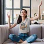 crop-top-mockup-of-a-woman-listening-to-music-at-home-44483-r-el2