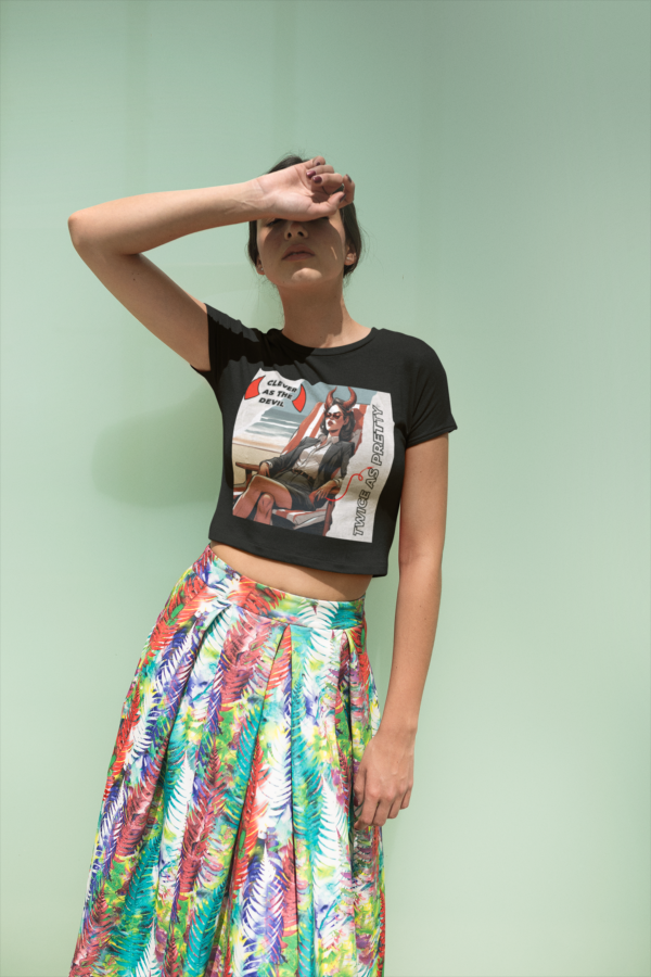 girl-blocking-the-sun-wearing-a-t-shirt-mockup-and-a-colorful-skirt-a19538