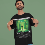 mockup-of-a-cheerful-man-pointing-at-his-oversized-round-neck-t-shirt-in-a-studio-m53040