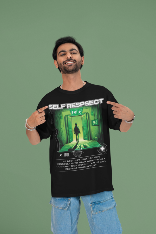 mockup-of-a-cheerful-man-pointing-at-his-oversized-round-neck-t-shirt-in-a-studio-m53040