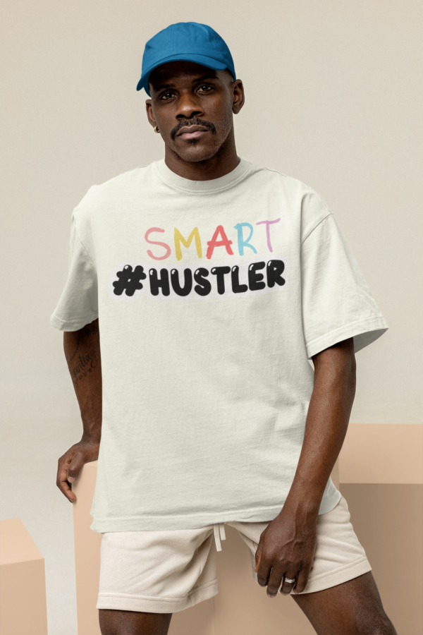 mockup-of-a-serious-man-wearing-an-oversized-tee-and-a-dad-hat-at-a-studio-m26647