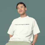 oversized-round-neck-tee-mockup-of-a-smiling-man-sitting-on-a-stool-in-a-studio-m38925-Copy