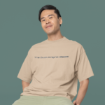 oversized-round-neck-tee-mockup-of-a-smiling-man-sitting-on-a-stool-in-a-studio-m38925_1_-Copy