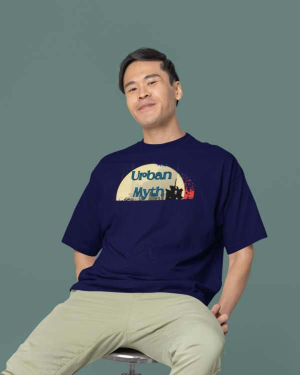 oversized-round-neck-tee-mockup-of-a-smiling-man-sitting-on-a-stool-in-a-studio-m38925_2_94bdfcaf-fb84-429a-882b-a8c4ce5b407d