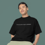 oversized-round-neck-tee-mockup-of-a-smiling-man-sitting-on-a-stool-in-a-studio-m38925_4_-Copy