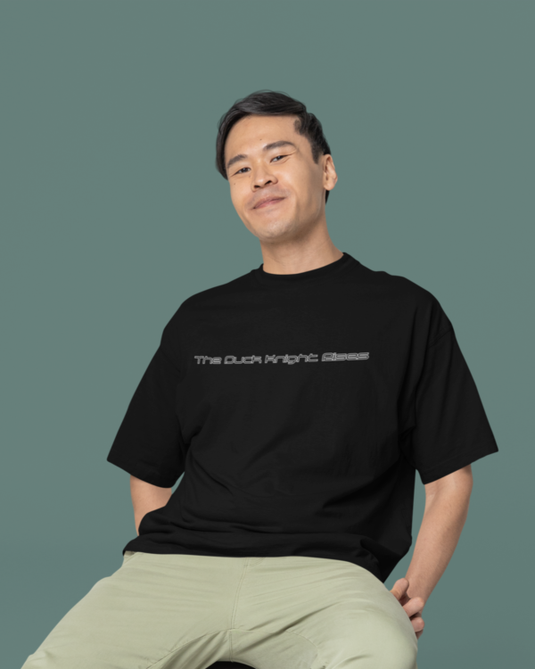 oversized-round-neck-tee-mockup-of-a-smiling-man-sitting-on-a-stool-in-a-studio-m38925_4_-Copy