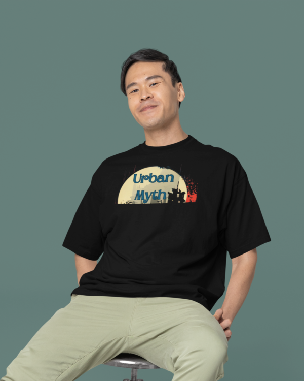 oversized-round-neck-tee-mockup-of-a-smiling-man-sitting-on-a-stool-in-a-studio-m38925_4_e6235e23-18e8-4f43-aba9-aaa2695cd6ab