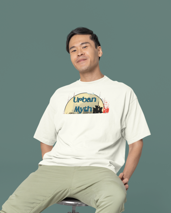 oversized-round-neck-tee-mockup-of-a-smiling-man-sitting-on-a-stool-in-a-studio-m38925_92ee1cd4-e1a4-458a-b803-e78323717322