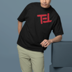 oversized-t-shirt-mockup-featuring-a-man-leaning-on-a-colorful-cube-m38921