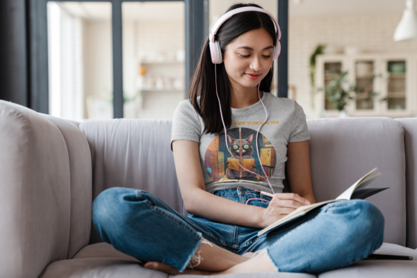 t-shirt-mockup-of-a-woman-with-headphones-at-home-44481-r-el2
