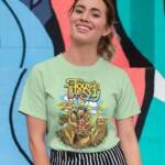 tee-mockup-of-a-smiling-girl-in-front-of-a-wall-with-colorful-illustrations-26646_1_c066f4ac-20f4-439d-8cf5-6c331043c805
