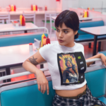 woman-wearing-a-crop-top-tee-mockup-in-a-diner-restaurant-a19412
