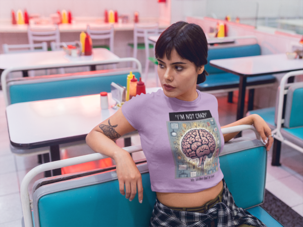 woman-wearing-a-crop-top-tee-mockup-in-a-diner-restaurant-a19412