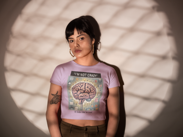 woman-wearing-a-crop-top-tshirt-mockup-facing-a-light-a19422