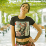woman-wearing-a-round-neck-tee-mockup-at-a-hall-with-plants-a19533