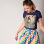 woman-with-a-skirt-wearing-a-round-neck-tee-mockup-against-a-white-wall-a19545